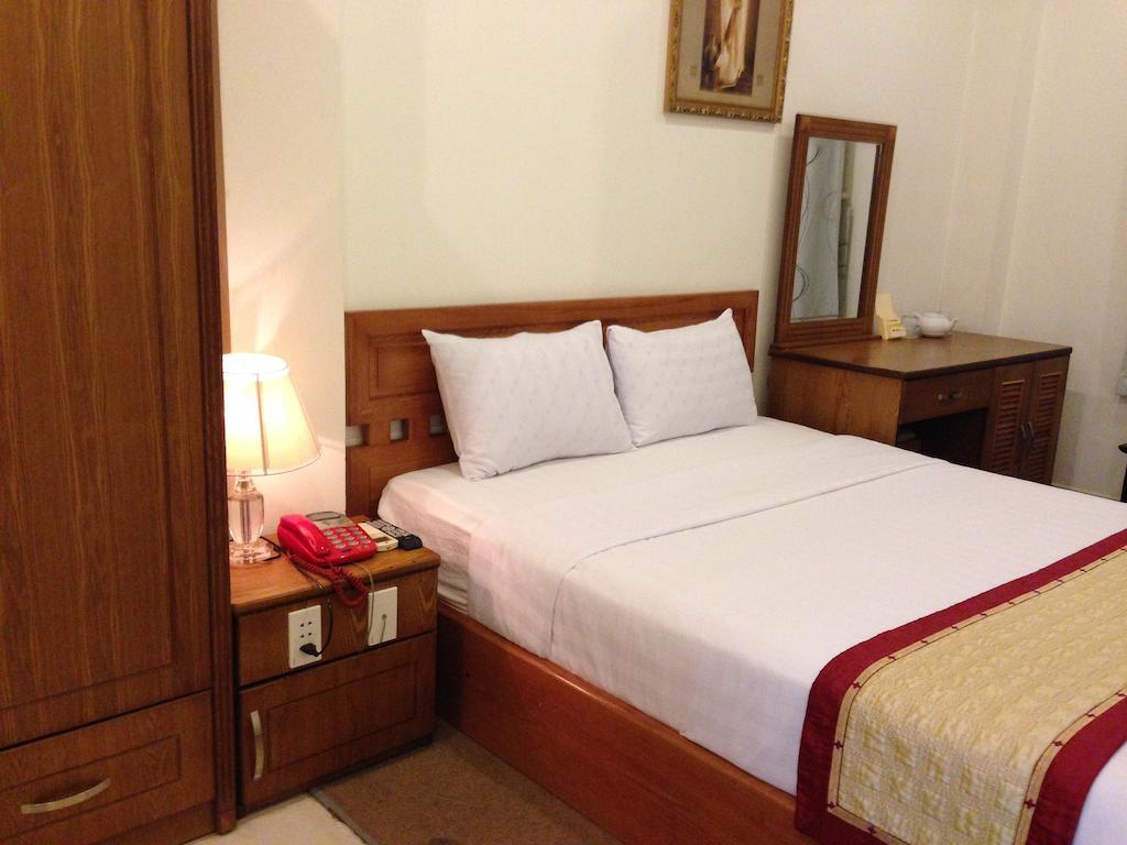 Nam Son Hotel Хошимин Стая снимка